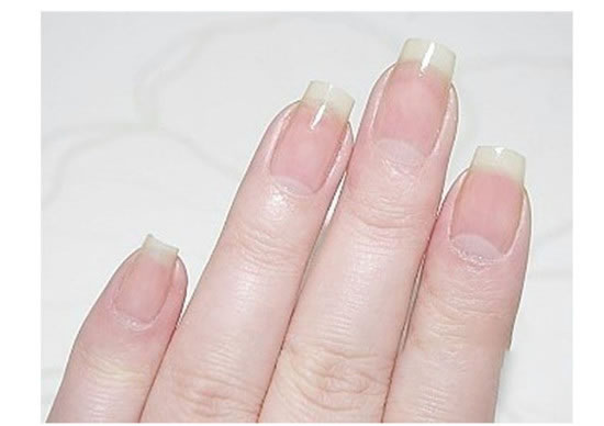 Black and white French manicure tutorial step picture