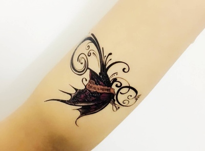Simple and stylish little tattoo with unique personality